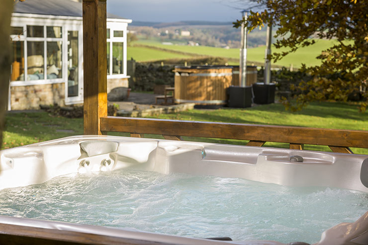 Covered hot tub with stunning views